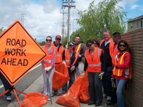 lions picking up trash photo