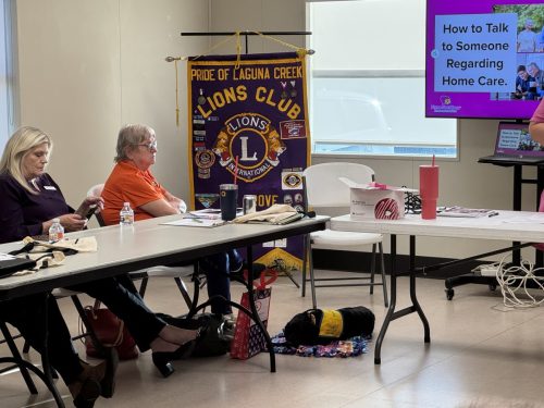 Lion Jeri with Leslie (Canine Companion Puppy) and Welbe Health Speaker Denise Grudin 